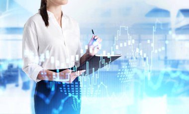 Bulanık şehirde çalışan ve mali tabloları iki kat açık olan tanınmamış genç bir iş kadını. Tonu ayarlanmış resim