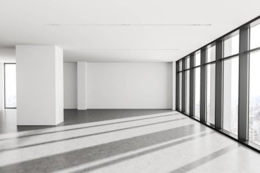 Beyaz duvarları, beton zemini ve bulanık manzaralı pencereleri olan boş panoramik ofisin içi. 3d oluşturma