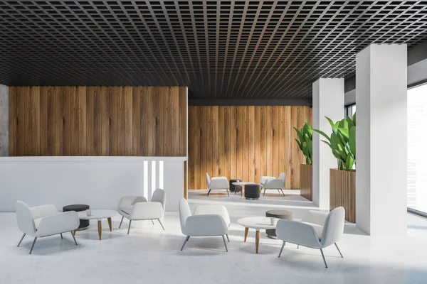 Beyaz ve ahşap duvarları, beton zemini ve beyaz koltukları olan şık ofis bekleme odasının içinde. 3d oluşturma