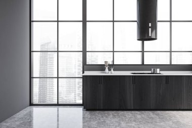 Gri dolaplar gri duvarları ve beton zemini olan şık bir mutfakta duruyor. 3d oluşturma