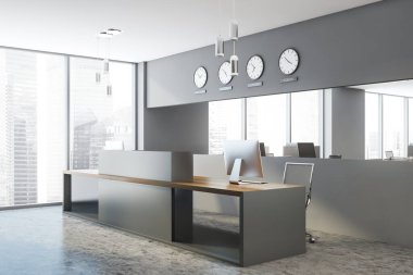 Gri duvarları ve beton zemini olan şık ofis bekleme odasının köşesinde duran rahat gri resepsiyon masası. 3d oluşturma