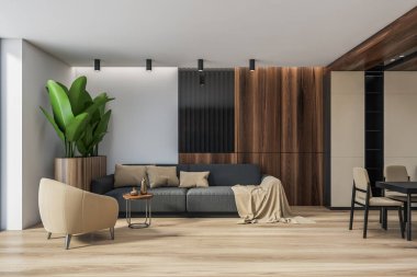 Beyaz ve ahşap duvarları, ahşap zemini, gri kanepesi ve bej koltuğu olan modern oturma odasının içi. 3d oluşturma