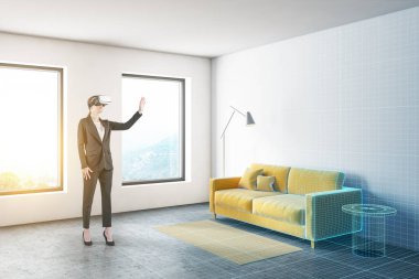 Sanal gerçeklik gözlüklü genç bir kadın odasının içini planlıyordu. Teknoloji ve iç tasarım kavramı. Renkli resim çift pozlama