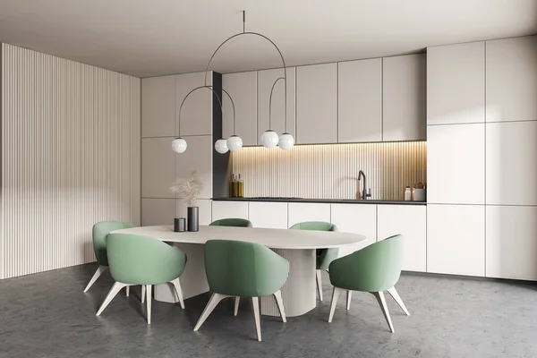 现代厨房的拐角处 有白色的墙壁 混凝土地面 白色的橱柜和有绿色椅子的餐桌 3D渲染 — 图库照片