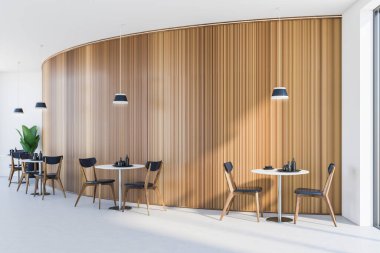 Beyaz ve ahşap duvarları, beton zemini, yuvarlak masaları ve siyah sandalyeleri olan şık, yuvarlak bir restoran. Küçük işletme kavramı. 3d oluşturma