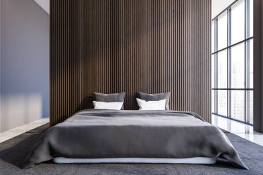 Karanlık ahşap ve gri duvarları, beton zemini ve rahat kral yatağı olan modern ana yatak odasının içi. 3d oluşturma