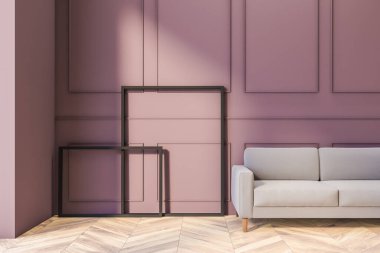 Kırmızı duvarları, ahşap zemini, uzun gri kanepesi ve resim çerçeveleri olan şık bir oturma odası. 3d oluşturma