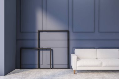 Mavi duvarları, beton zemini, uzun beyaz kanepesi ve resim çerçeveleri olan modern oturma odasının içi. 3d oluşturma