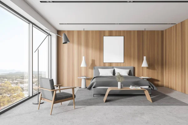 Interior of modern master bedroom with white and wooden master bedroom corner with concrete floor, comfortable king size bed, armchair and mock up poster. 3d rendering