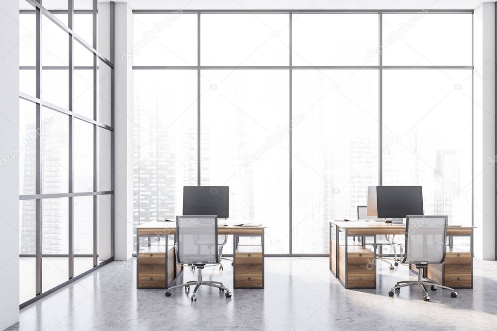 Front view of modern open space office with white walls, concrete floor, wooden computer tables and big windows with blurry cityscape. 3d rendering