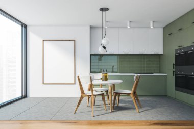 Beyaz ve yeşil duvarları olan şık bir mutfak, fayanslarla döşenmiş döşeme, eşyalar halinde inşa edilmiş yeşil dolaplar ve sandalyeli yuvarlak yemek masası. Dikey maket posteri. 3d oluşturma