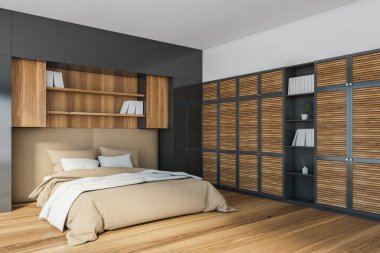 Gri ve ahşap duvarları, ahşap zemini, rahat kral yatağı ve kitaplıkları olan modern ana yatak odasının köşesi. 3d oluşturma