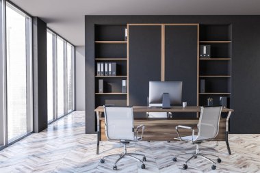 Gri duvarları, ahşap zemini ve bilgisayar masası olan şık bir CEO ofisi. Liderlik kavramı. 3d oluşturma