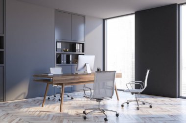 Gri duvarları, ahşap zemini ve bilgisayar masası olan minimalist CEO ofisinin köşesi. 3d oluşturma