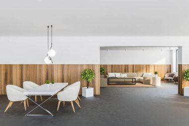 Beyaz ve ahşap duvarlı modern yemek odasının içi beton zemin, arka planda beyaz koltuklar ve oturma odası olan yemek masası. 3d oluşturma