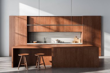 Minimalist ada tezgahı ve bar taburesi, yumuşak doğal aydınlatma, gri beton zemin ve temiz duvar zeminli gösterişli modern ahşap mutfak. 3B Hazırlama