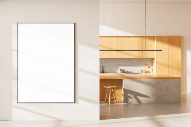 Modern aydınlık ahşap mutfağın yanındaki beyaz duvarda dikey poster modeli, beton dokular, güneş ışığı ve yumuşak gölgelerle minimum iç mimari. 3B Hazırlama