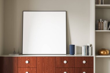 Ahşap dolap, minimalist iç mekan tarzı, beyaz duvar arkaplanı, ev dekorasyonu ve modern tasarım kavramı üzerine boş poster bilgisayarı. 3B Hazırlama