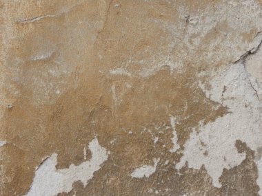 Sarı kahverengi çizik yıpranmış beton duvar. Grunge duvar arka plan veya web afiş. Sıkıntılı eski duvar vintage renk.