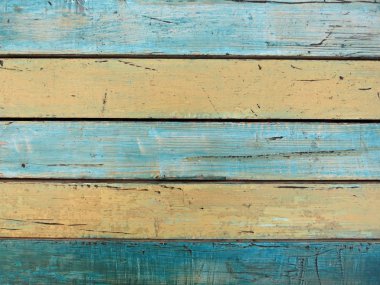 Shabby ahşap doku, arka plan ve duvar kağıdı boyalı - mavi ve sarı. Ahşap tahtalardan yapılmış duvar. Yatay kompozisyon