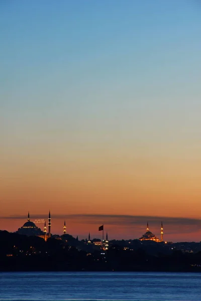 Suleymaniye and Fatih Mosques during blue hour.