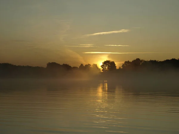 Foggy Blured Orange Sunrise River Burning Sky Reflected Calm Water — Stock Photo, Image