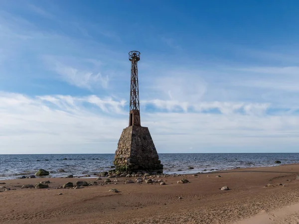 seashore landscape, dunes, sunny spring day, Kumrags lighthouse in the background, Vidzeme coast, Baltic Sea, Latvia