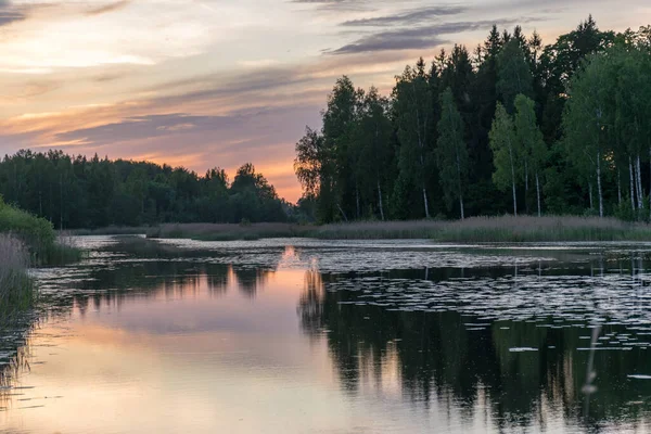 summer picture with beautiful colorful sunset over the lake, a wonderful place of strength and energy, peace, harmony and quiet