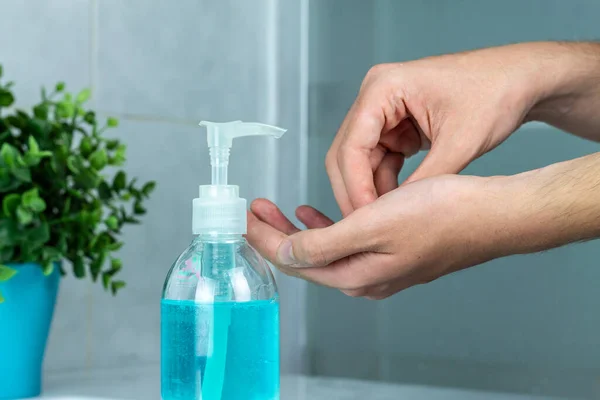 How to use Hydroalcoholic gel cleaning hands. concept of hand disinfection. Covid-19 hand sanitizer