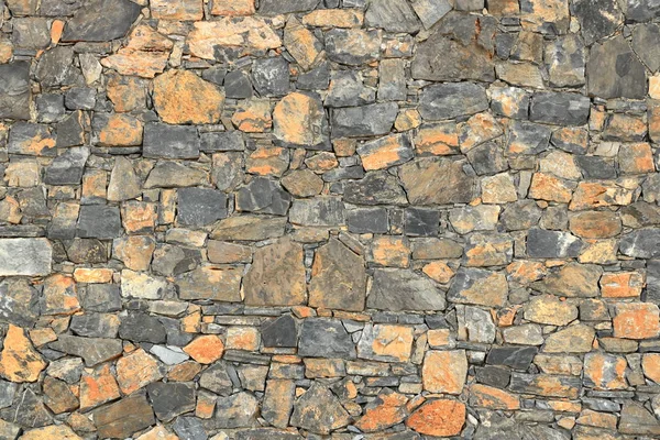 Gran pared gris de ladrillos de piedra —  Fotos de Stock