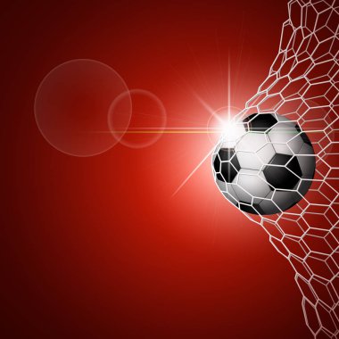 Futbol topu kalede. Kırmızı
