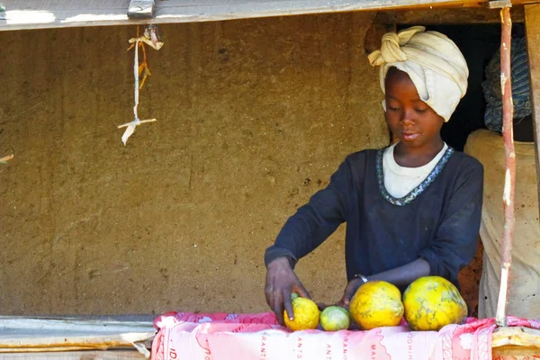 Poor African girl selling fruits - Madagascar