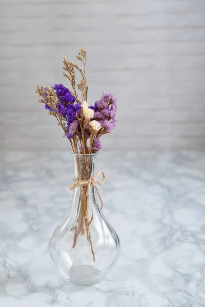 Bouquet purple dry flowers and bouquet dry Caspia flowers in Vase