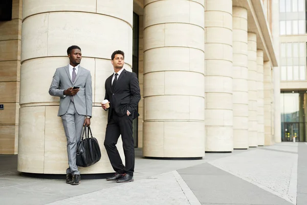 Two Multiethnic Businessmen Formal Wear Mobile Phone Coffee Walking Street — Stock Photo, Image