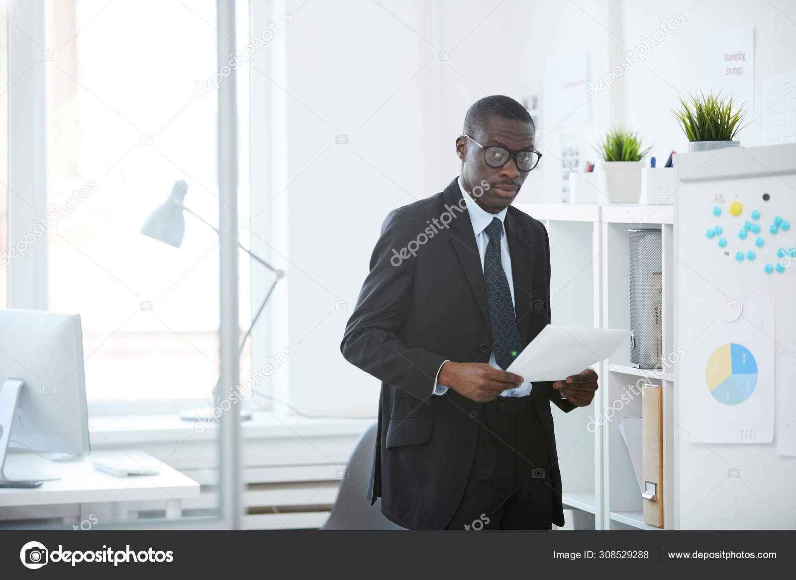 depositphotos 308529288 stock photo portrait african manager black suit