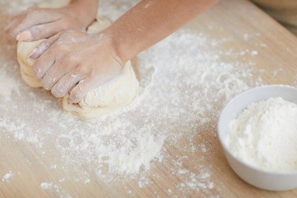 Woman making dough