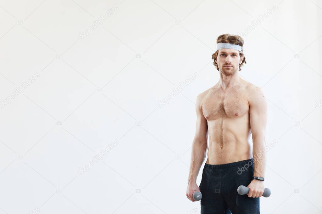 Man exercising with dumbbells