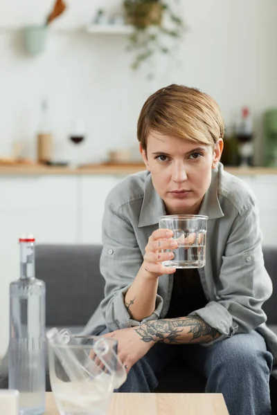 Woman drinking vodka