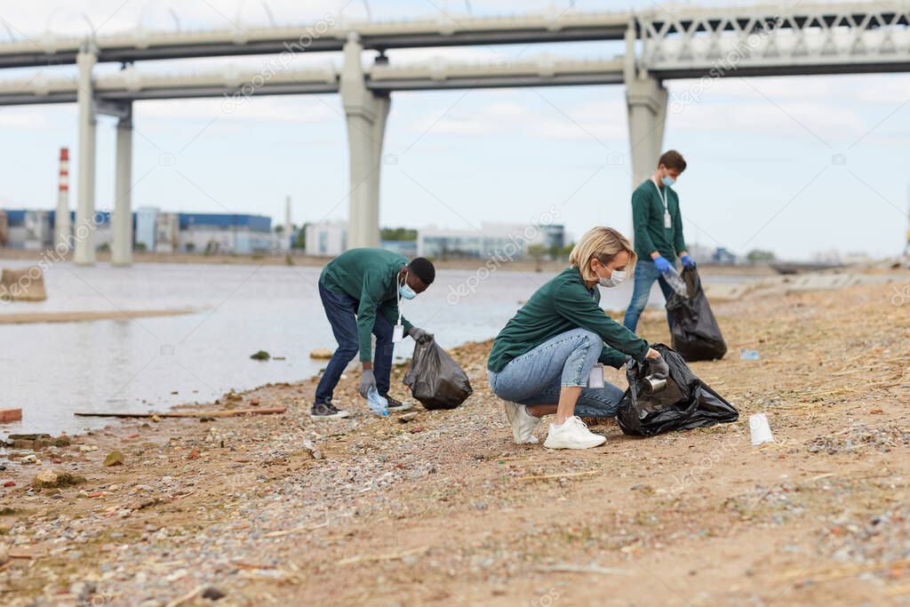 Volunteers cleaning the river