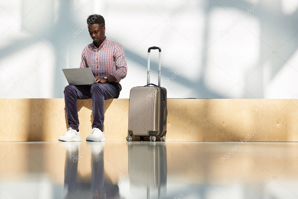 Businessman working at the airport