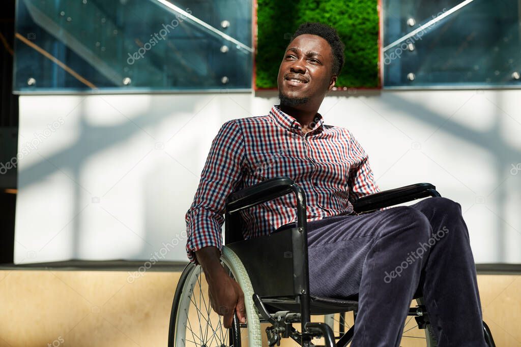 African man in wheelchair