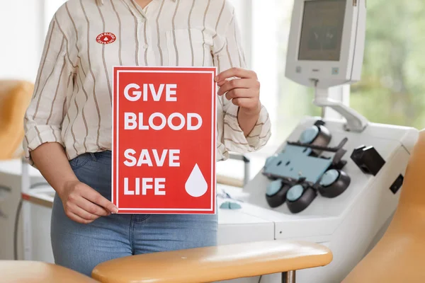 Close Female Donor Holding Poster While Standing Hospital — Stock Photo, Image