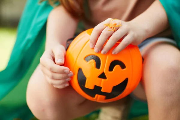 Girl with toy pumpkin — Stock Photo, Image