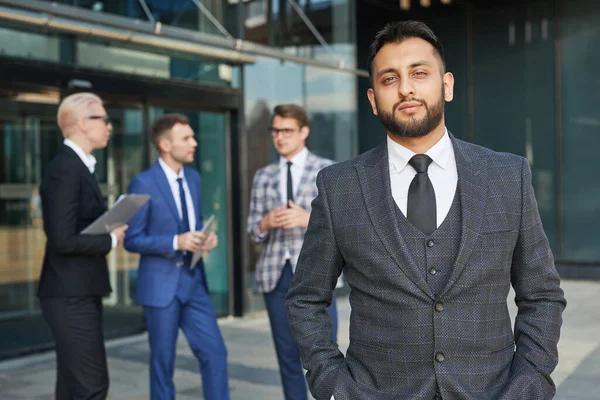 Young leader standing outdoors