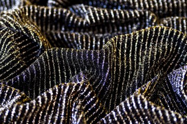 Pürüzsüz pembe ipek ya da saten lüks kumaş dokusu soyut bir arkaplan olarak kullanılabilir. Lüks arkaplan tasarımı