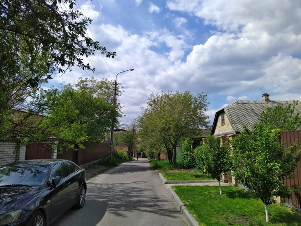 stock image Suburbia district street and houses at sunny day at spring season