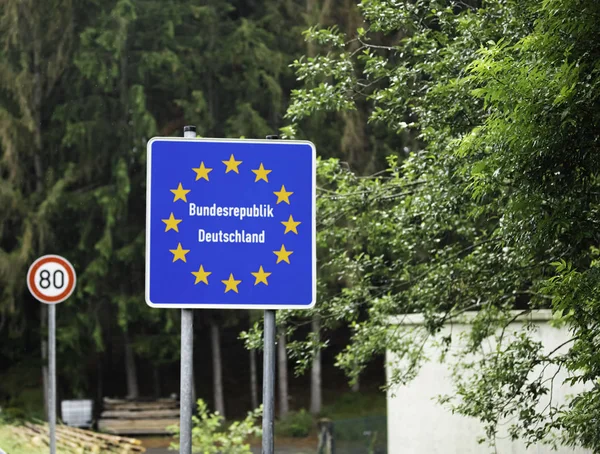 Road signs on the borders of the States of the European Union  Union The sign stands on the border of Germany