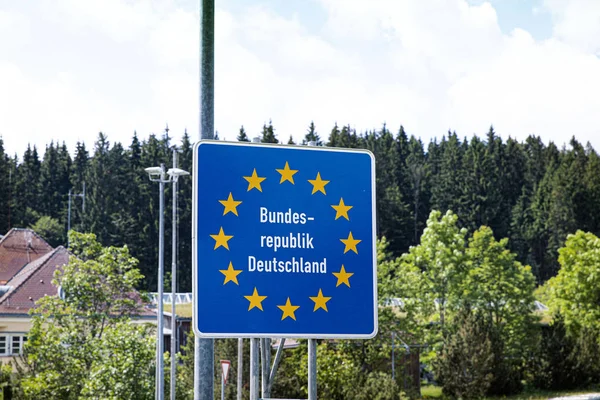 Road signs on the borders of the States of the European Union The sign stands on the border of Germany