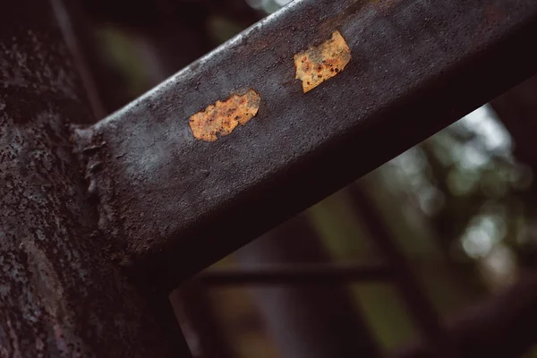 Old rusty metal.Mount between racks.