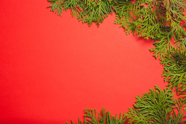 Festive composition on a red background. Template with place for text.